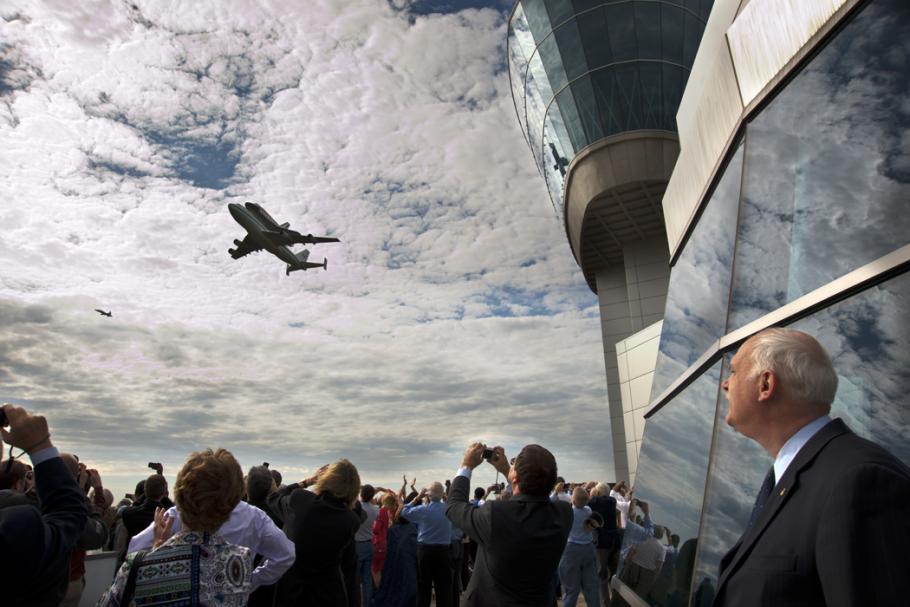 Space Shuttle Discovery passes by the Donald Engen Observation Tower