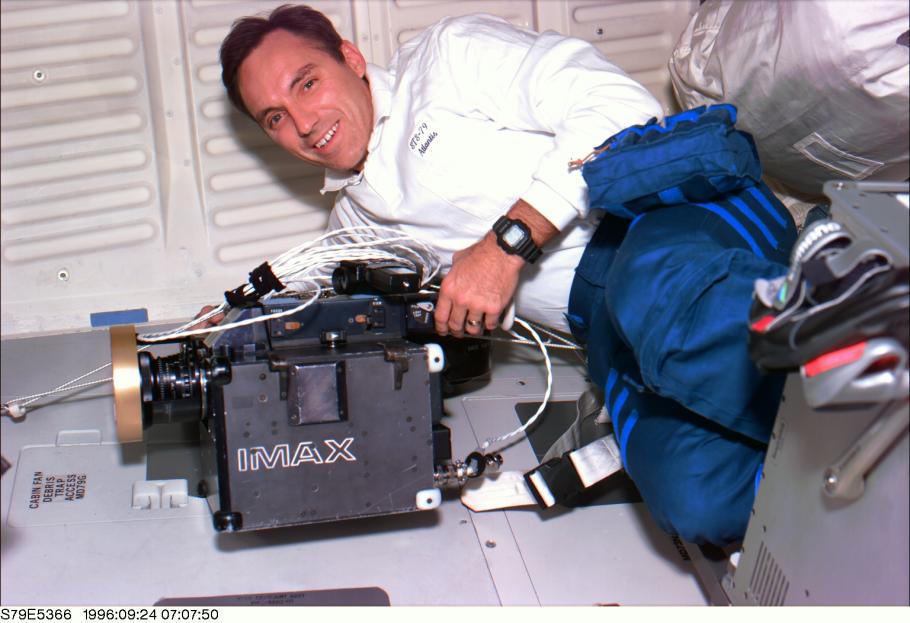 Astronaut Carl E. Walz with an IMAX Camera